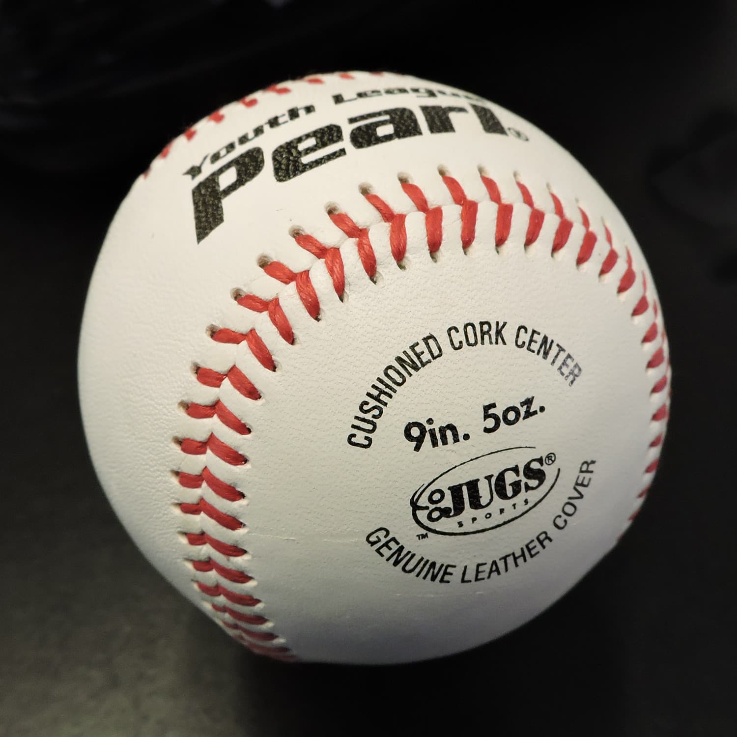 Bucket of JUGS Youth League Pearl Baseballs