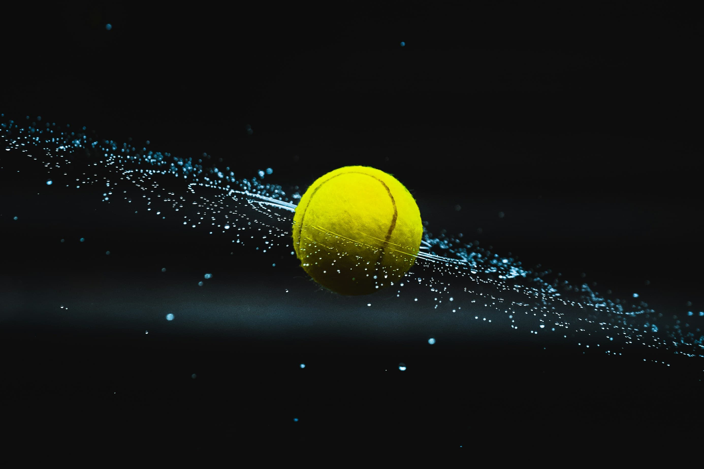 Tennis player loading a backhand.